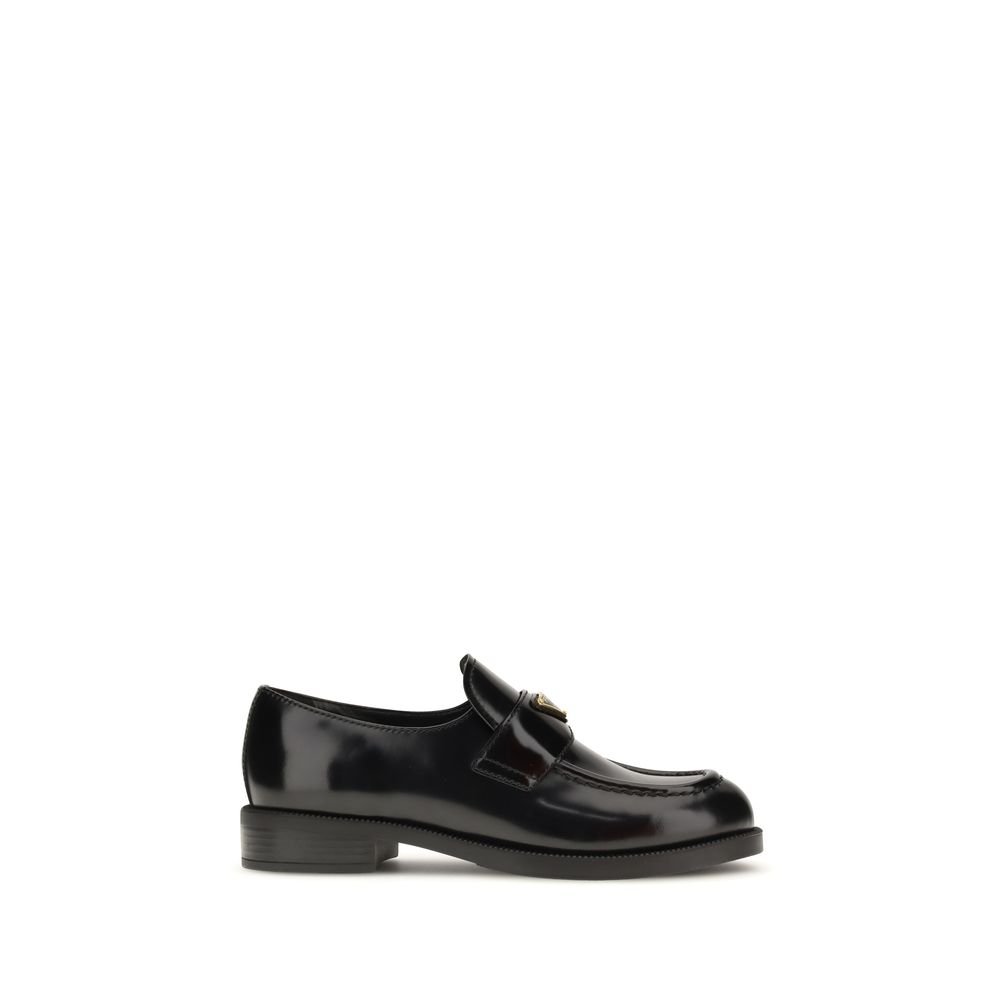 9975478.jpeg Prada Black Calf Leather Bos Taurus Slip-On Loafers - Image 1