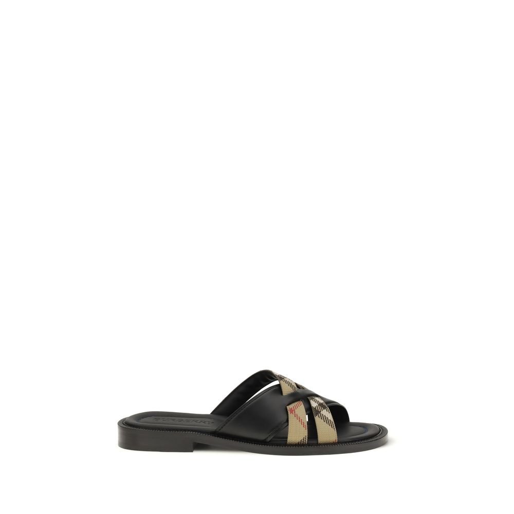 10216836-1.jpeg Burberry Black Calf Leather Bos Taurus Flat Sandals - Image 1