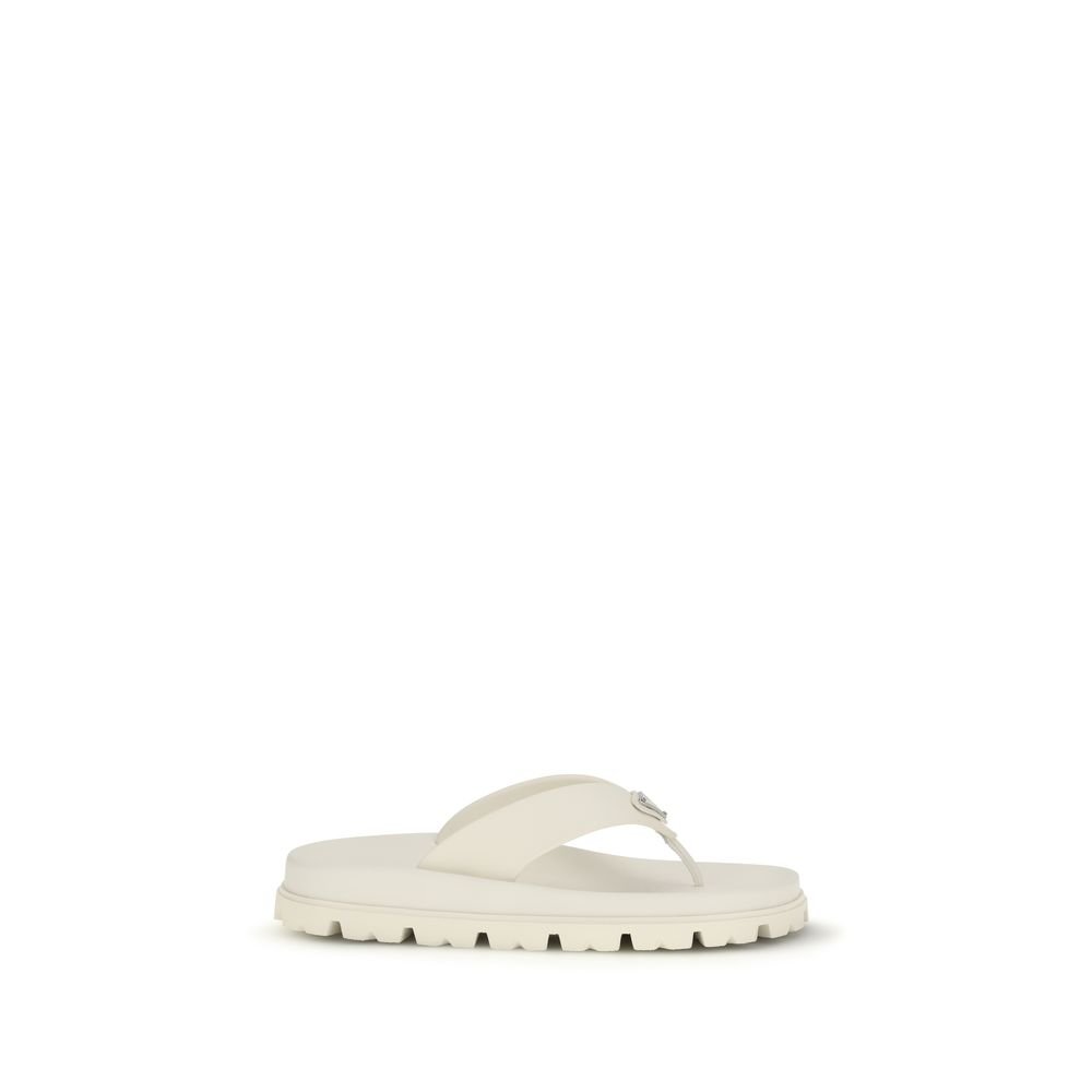 10347247.jpeg Prada White Rubber Flip-Flop Sandals - Image 1