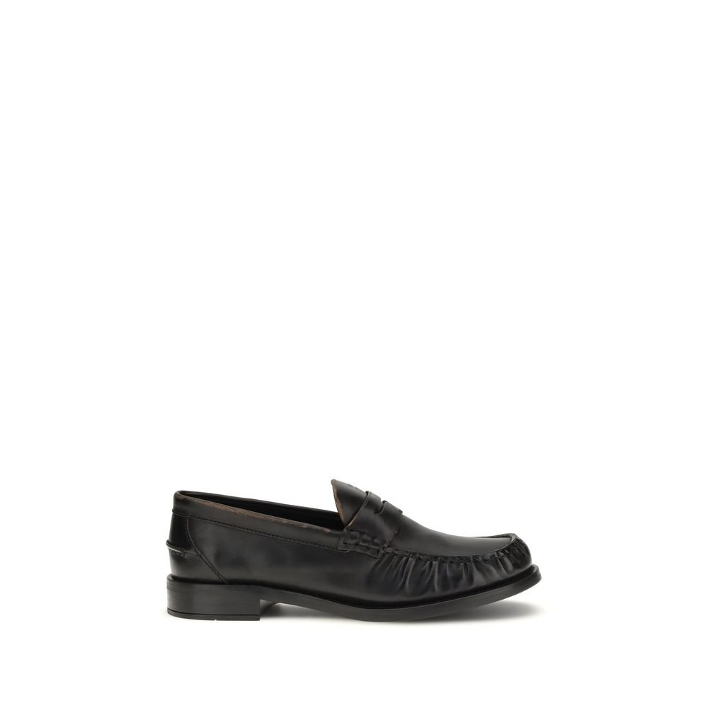 10378633.jpeg Prada Black Calf Leather Bos Taurus Slip-On Loafers - Image 1