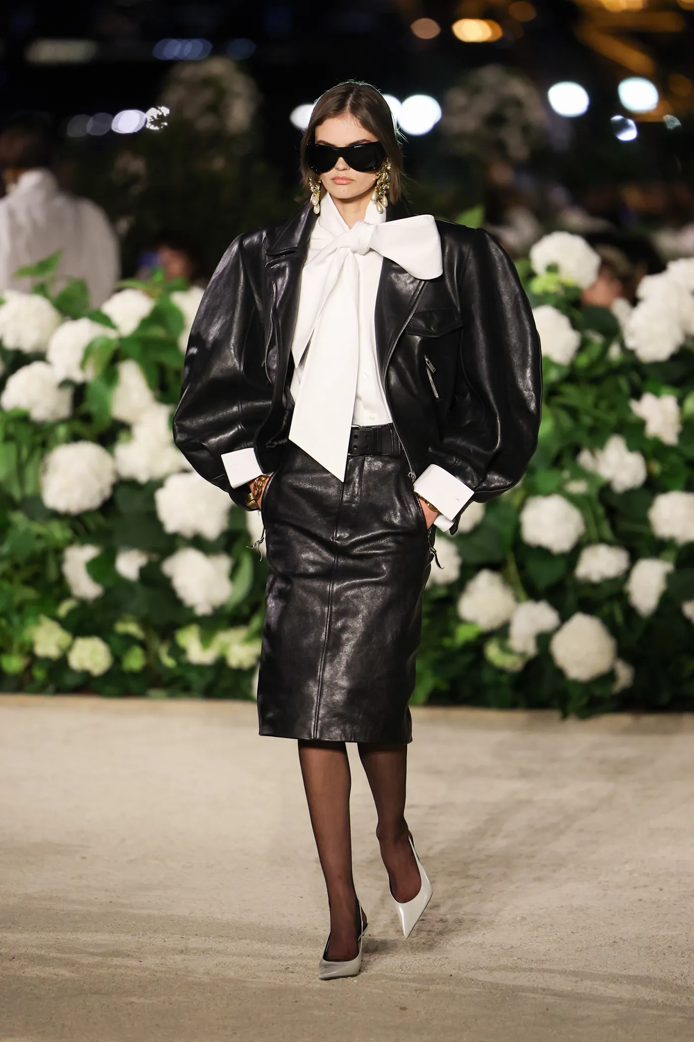 Structured power dressing SS26 black leather silhouette with strong shoulders