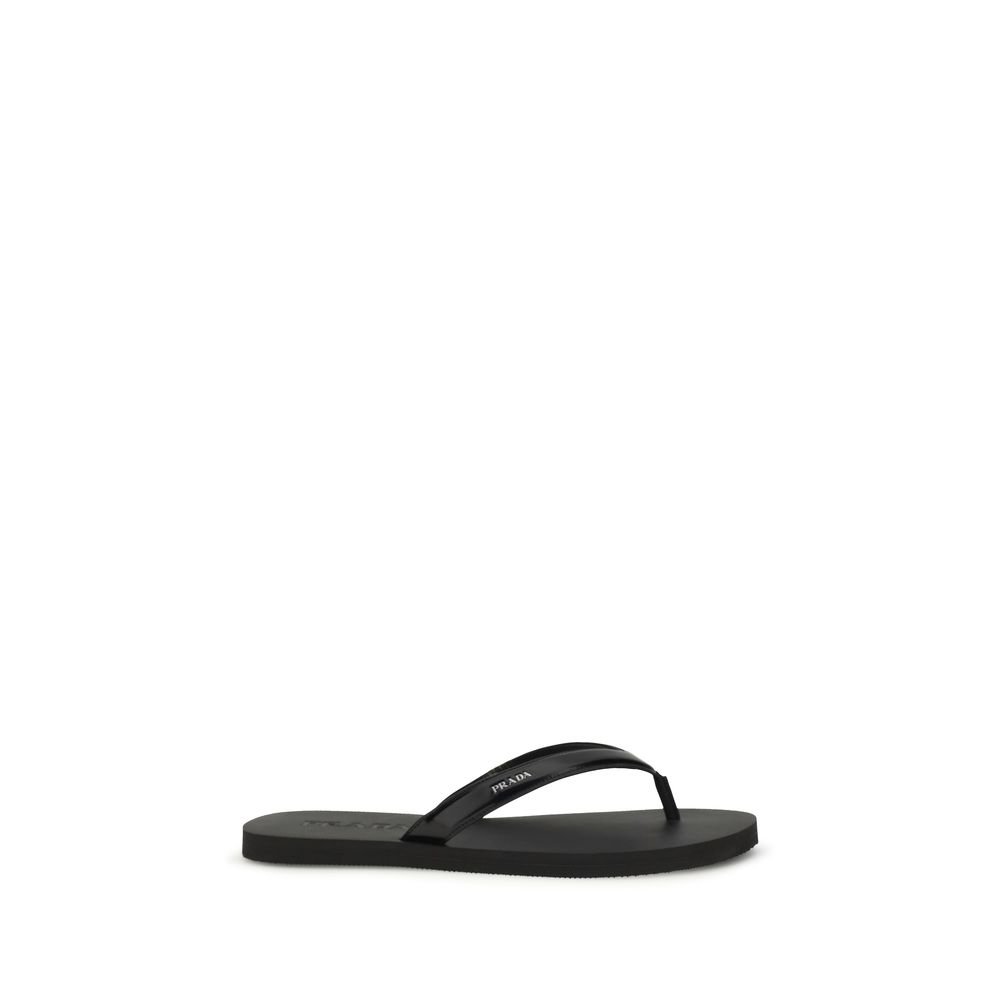 10514085.jpeg Prada Black Calf Leather Bos Taurus Flip-Flop Sandals - Image 1